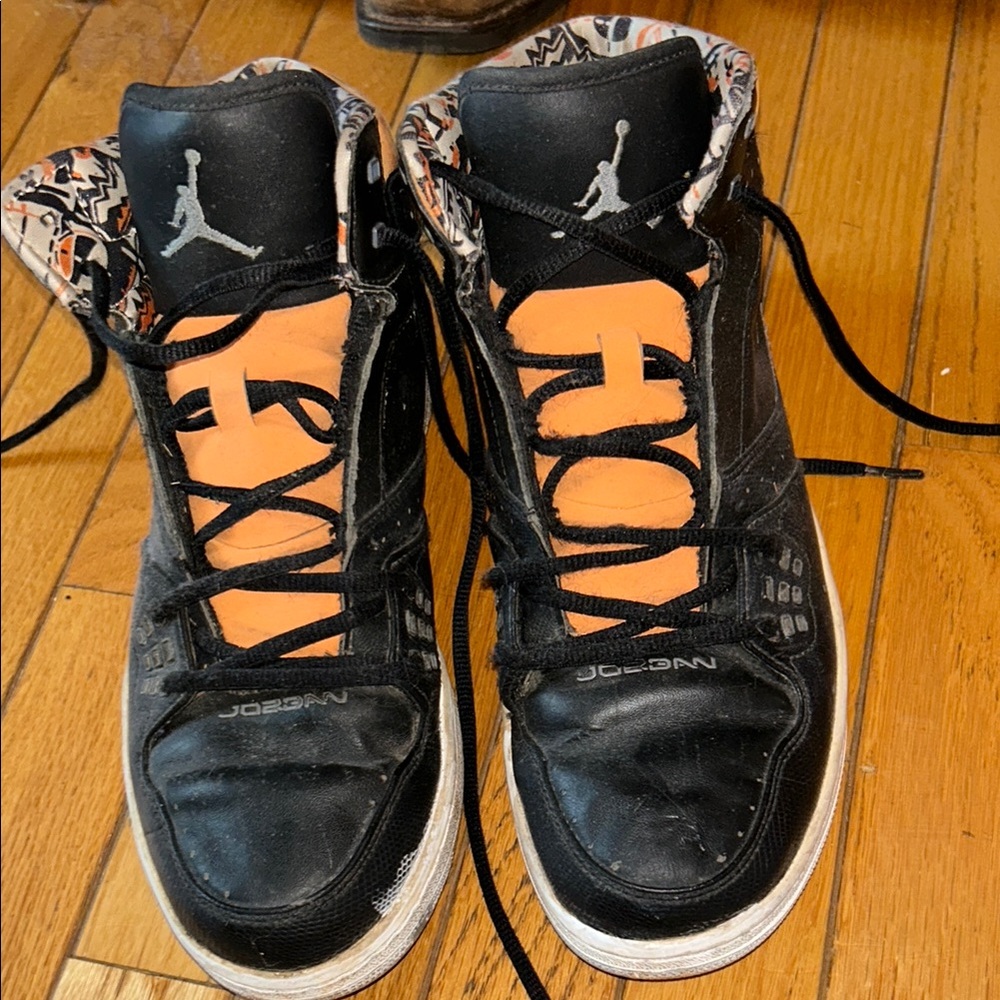 Black and Orange Jordan High-Top Sneakers